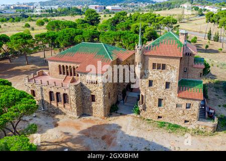 Colonia Guell, Spain - August 27, 2020: Modernist style building, Casa del Mestre (Teacher's house) designed by Francesc Berenguer in Company town, Co Stock Photo