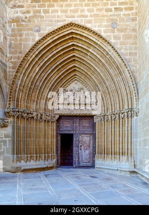 Spanish town Ujue (Uxue in Basque) and its 12th century fortified church in Navarre, Spain. Porch detail Stock Photo