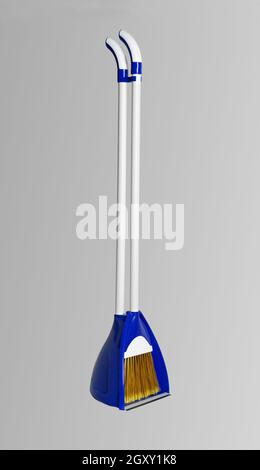 Broom with dustpan set. Close-up. Isolated on a gray background. Stock Photo