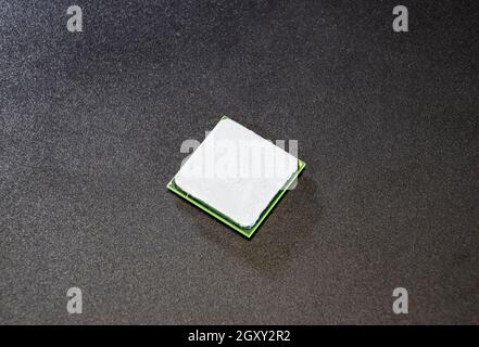 The processor of the computer with the thermal paste applied on it. Details of the computer's system unit Stock Photo