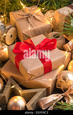 Christmas gifts on a festive background, close-up. Side view, close-up. Stock Photo