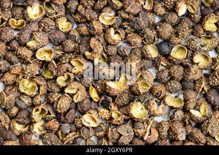 food background - dried sichuan pepper peppercorns Stock Photo