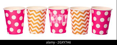 Paper disposable cups with colored pattern isolated on white background Stock Photo