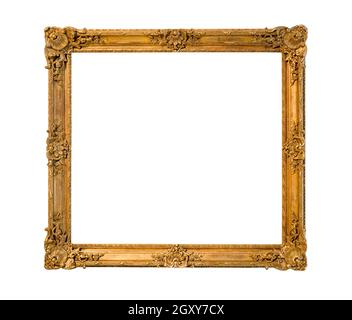 old ornamental wooden picture frame with cut out canvas isolated on white background Stock Photo