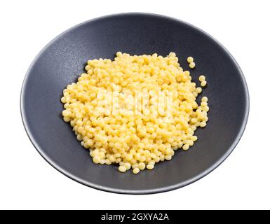boiled ptitim pasta (israeli couscous) in gray bowl isolated on white background Stock Photo
