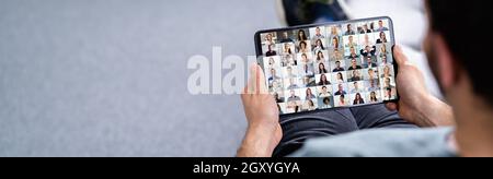 Virtual Online Video Conference Webinar Call On Tablet Stock Photo
