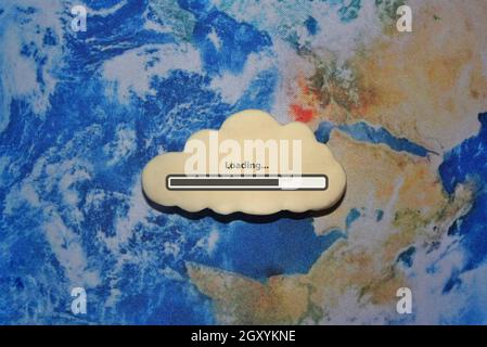 White cloud with Loading bar icon on earth globe Stock Photo