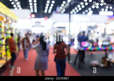 Abstract blur people in exhibition hall event trade show expo background. Business convention show, job fair, or stock market. Stock Photo
