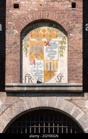 Coat of arms of the Visconti family in the Sforza Castle. Milan, Italy Stock Photo