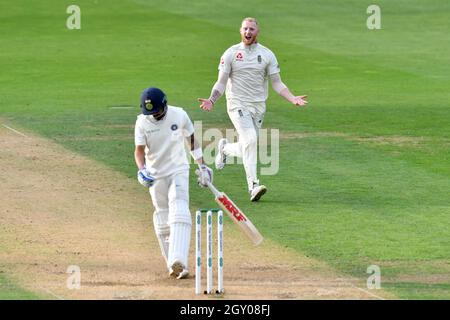 England’s Ben Stokes celebrates taking the wicket of India’s captain Virat Kohli during the test match at The Kia Oval, London. Stock Photo