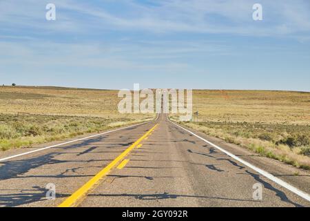 Open road in desert landscape Stock Photo