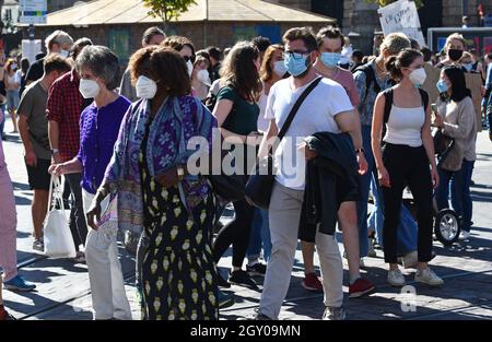 Freiburg Germany people wearing covid virus pandemic face masks in the street Stock Photo