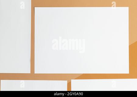Blank paper poster brochure a4 size mockup template on beige background. Stock Photo