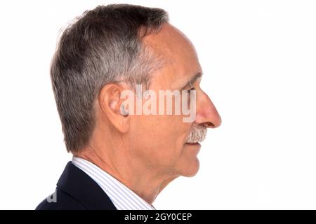 mature man with grey mustache side view . retired latino hispanic people smile with confident.senior latin man isolated on white. Close up face of hap Stock Photo