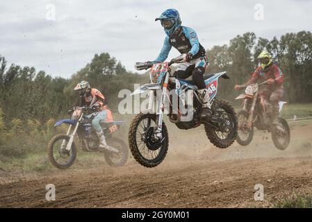 GLOGOW, POLAND - SEPTEMBER 25, 2021: IX. round of the Polish Championships and the Polish Cross Country Cup. Motorcyclists during the race. Stock Photo