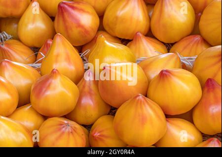 Ananas tomato sold at a market stall on place Richelme in Aix-en-Provence, southern France Stock Photo