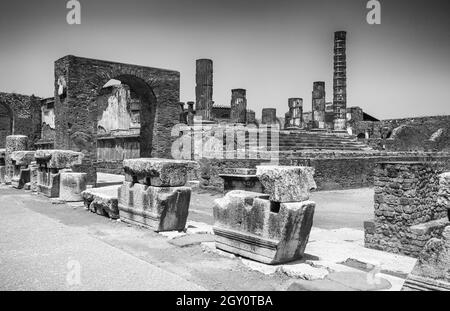 Grayscale shot of ancient Pompeii city ruins in Italy destroyed by the eruption of Mount Vesuvius Stock Photo