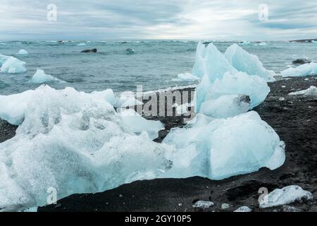 Icebergs and black sand on Jokulsarson Diamond beach, Iceland Stock Photo