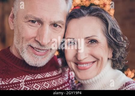 Close-up pphoto portrait couple celebrating winter holidays together smiling happy overjoyed Stock Photo