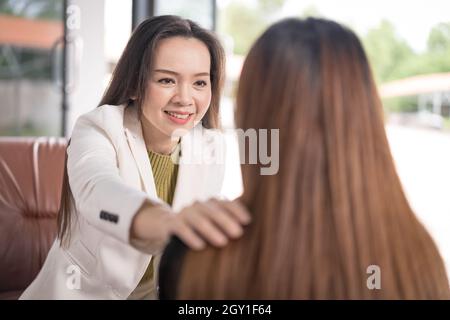 Young woman consulting with the psychologist. Stock Photo