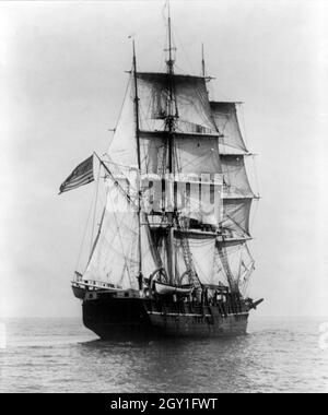 Vintage photo circa 1927 shows of the Charles W. Morgan a three masted whaling ship.   Launched in 1841 she is the world's oldest surviving merchant vessel and the only surviving wooden whaling ship from the 19th century American merchant fleet Stock Photo