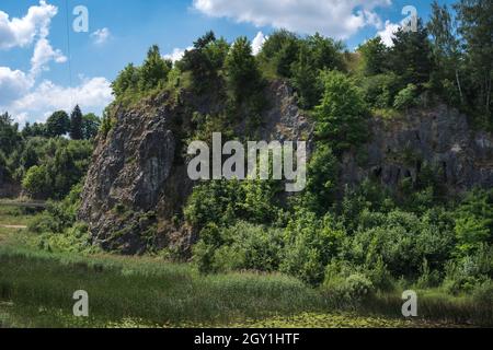 geological landscape of former limestone quarry and current nature reserve Kadzielnia in the city of Kielce in Poland Stock Photo