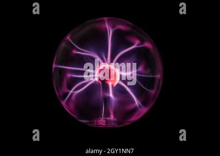glowing plasma ball with light beams Stock Photo