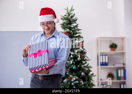 Young teacher celebrating new year at school Stock Photo