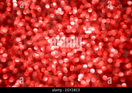 Red defocused lights background. Abstract festive backdrop Stock Photo
