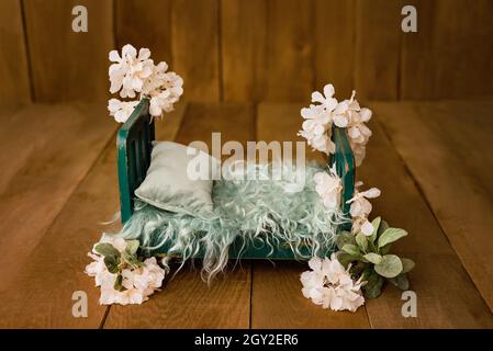 Newborn Digital Background Spring flowers Basket Prop for Newborn. For boys and girls. Wood back. shoot set up with prop bed and wood backdrop Stock Photo