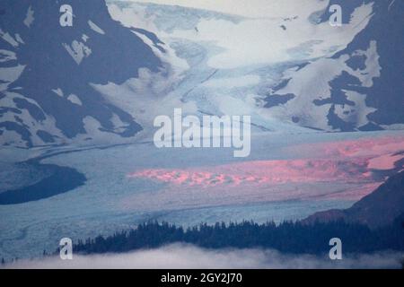 Summer sunset colors over Grewingk Glacier, Homer, Alaska, USA Stock Photo