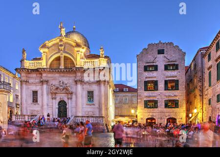 Evening scene with Church of Saint Blaise in Dubrovnik, Croatia along the Stradun - the main street of the walled city. Stock Photo