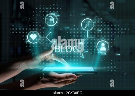 Social media and blog concept. Futuristic icon design and graphics above hand with smartphone. Stock Photo
