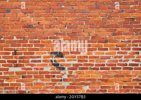 Texture of orange and red brick wall Stock Photo
