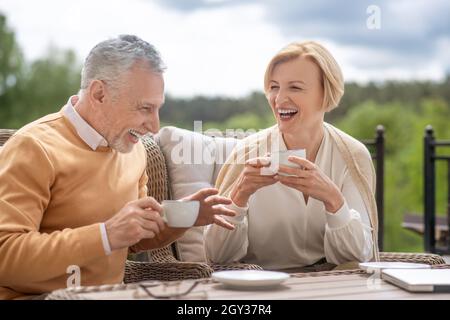 Two married people having a good time outdoors Stock Photo