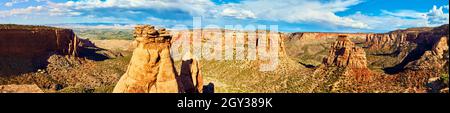 Panorama of large canyon with rocky pillars in desert Stock Photo