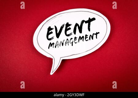Event Management concept. White speech bubble on a red background. Stock Photo