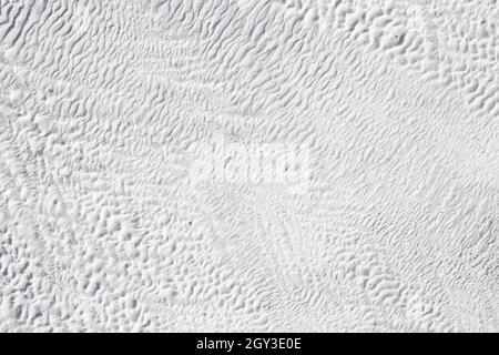 White texture of abstract background of Pamukkale calcium travertine in Turkey. Stock Photo