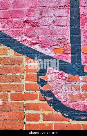 Texture of red bricks with black and red paint Stock Photo