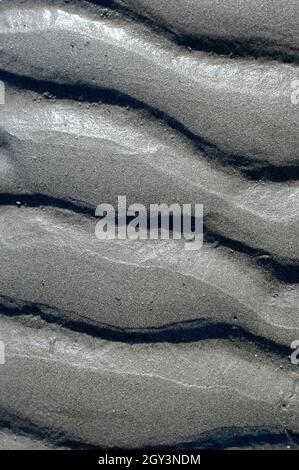 Sand ridges on a beach. Stock Photo