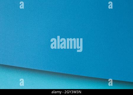 Abstract blue layered color paper background Stock Photo