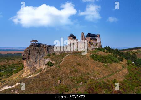 Castle of Boldogko in Hungary. Medival fort in Zemplen mountins in clean panoramic landscape. Famous tourist attraction in north Hungary. Stock Photo