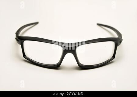 Reading glasses with black frames on a white background Stock Photo