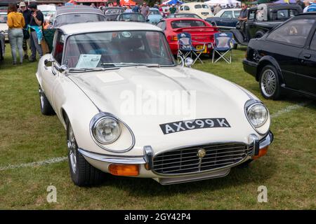 naphill, England - August 29th 2021: A white Series 3 Jaguar E type 2+2. The car was in production between 1971 and 1974. Stock Photo