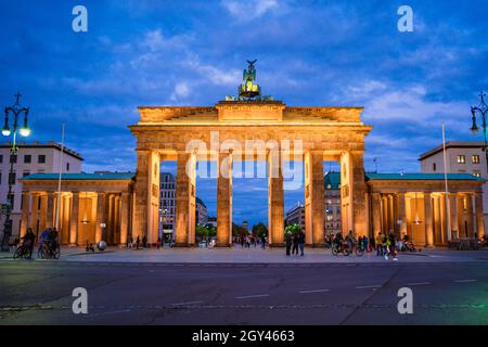 Berlin, Germany. September 1, 2021.  Berliners gather around Brandenburg Gate at dusk. Stock Photo