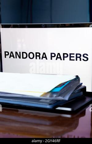 Screen with Pandora papers inscription. Pandora Papers is 11.9 million leaked documents that were published by the  International journalists Stock Photo
