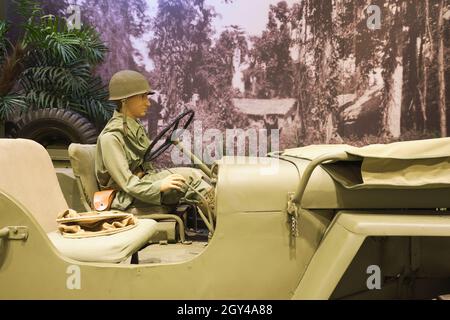 A diorama of a WWII era Willys Jeep, fitted for train, rail track use in the Pacific jungle. At the US Army Transportation Museum at Fort Eustis, Virg Stock Photo