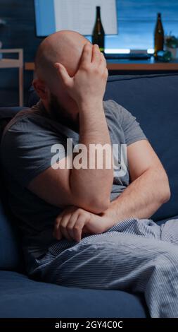 Confused frustrated nevous man breaking letter, debt notification, bad financial report, money problem, eviction notice. Shocked, worried tenant reading warning document for unpaid bank bills Stock Photo