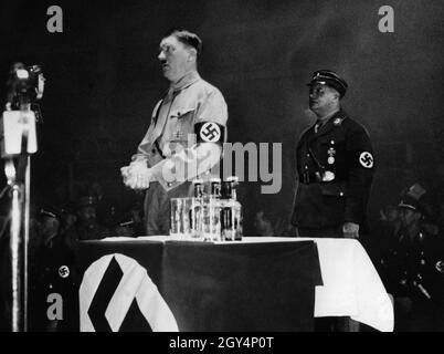 Ernst Röhm was one of Adolf Hitler's less dozens friends, whose homosexual disposition, moreover, had been known for a long time. Here Hitler and Röhm are seen together in the Berlin Sportpalast. [automated translation] Stock Photo
