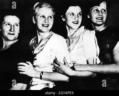 'Franziska Braun with her daughters Ilse, Margarete ''Gretl'' and Eva. Ilse was skeptical of National Socialism, Gretl married SS officer Hermann Fegelein, who served as the SS liaison officer to the Führer's headquarters. Since Hitler kept his liaison with Eva Braun largely secret, the connection through her brother-in-law was the apparent explanation for her presence in Hitler's inner circle to outsiders. [automated translation]' Stock Photo